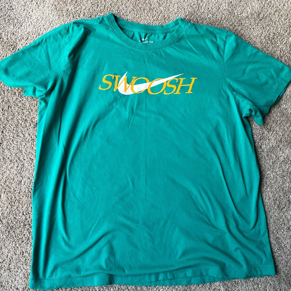 Nike Swoosh t-shirt. Blue Green color. Size XL. Excellent preowned condition.